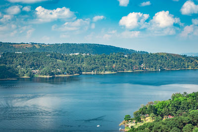 Serene lake with mountain background at day from top angle