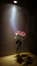 Flower vase on table at home