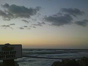 Scenic view of sea against sky at sunset