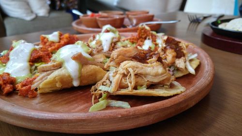 Close-up of mexican food served on table