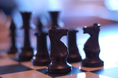 Close-up of chess pieces on board