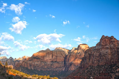 Rock formations on landscape against sky