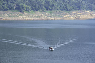 High angle view of boat sailing on sea