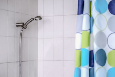 Close-up of faucet in bathroom