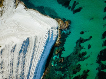 High angle view of dam on sea shore