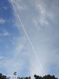 Low angle view of vapor trail in sky