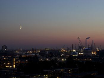 Illuminated cityscape at night