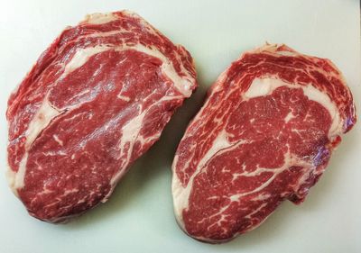 Close-up of meat on white background