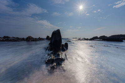 Scenic view of sea against sky during sunset