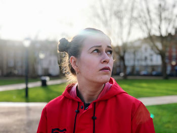 Portrait of young woman looking away