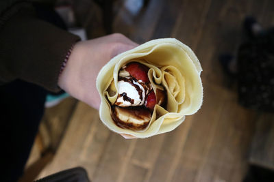 High angle view of ice cream cone on table