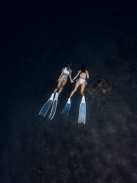 High angle view of man swimming in sea