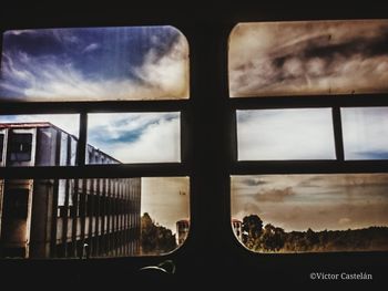 Reflection of sky on glass window