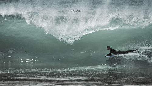 Man surfing in sea