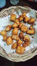 High angle view of bread in basket on table