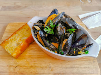 High angle view of fish in plate on table