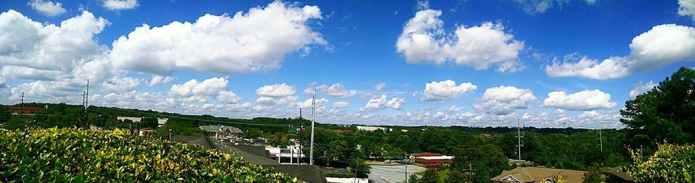 High angle view of city against cloudy sky