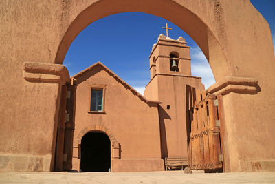 Exterior of historic building against clear sky