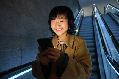 Young woman using mobile phone