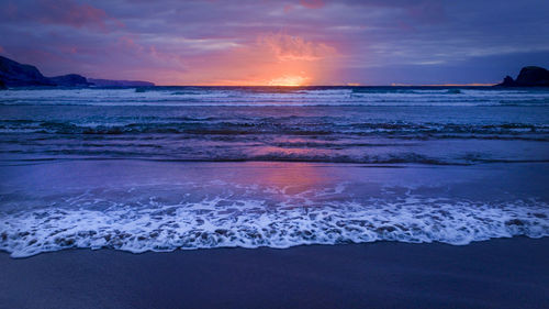 Scenic view of sea against sky during sunset