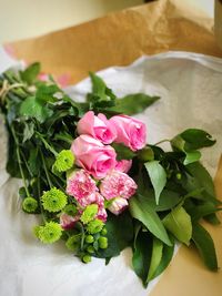 Close-up of pink flowers on table