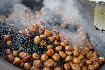 Close-up of roasted coffee beans in container