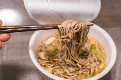 Close-up of noodles in bowl on table