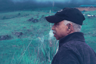 Side view of man looking away