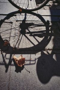 High angle view of bicycle on footpath