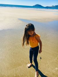 Full length of woman on beach