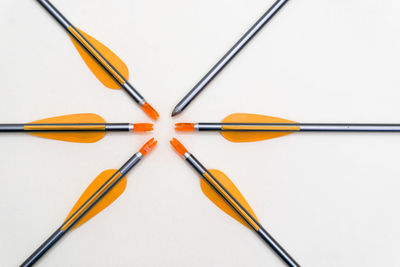 High angle view of multi colored pencils on white table