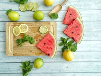 High angle view of fruits on cutting board