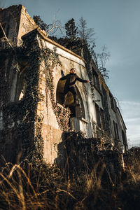 Abandoned building against sky