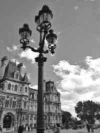 Low angle view of street light against sky
