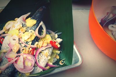 High angle view of various vegetables in container