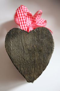 Close-up of heart shape over white background