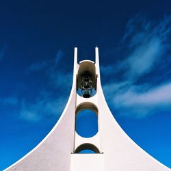 Low angle view of building against blue sky