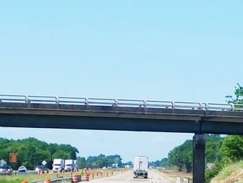 Low angle view of bridge against clear sky