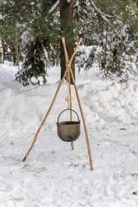 Winter campfire in woods. cooking in field conditions