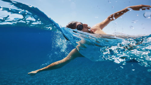 Freestyle swimming in the sea