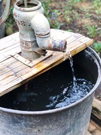 High angle view of drinking water in container