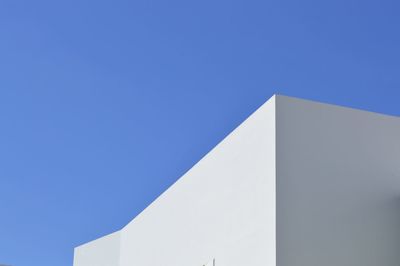 Low angle view of building against blue sky