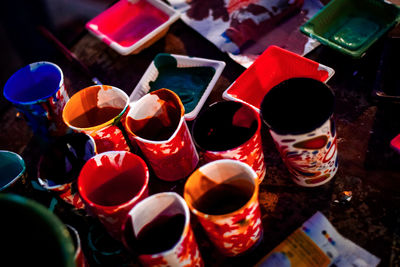 High angle view of various containers on table