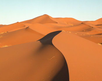 Scenic view of desert against sky