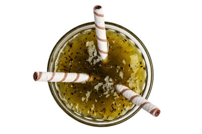 High angle view of drink in bowl against white background
