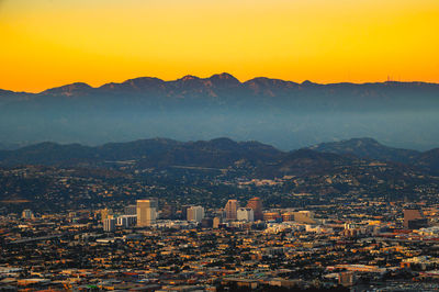 High angle view of townscape against sky during sunset