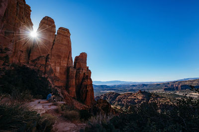 Sun shining through rocks