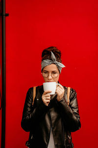 Young woman drinking coffee