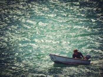 Person sitting in boat