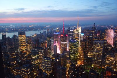 Bank of america tower amidst cityscape against sky at manhattan